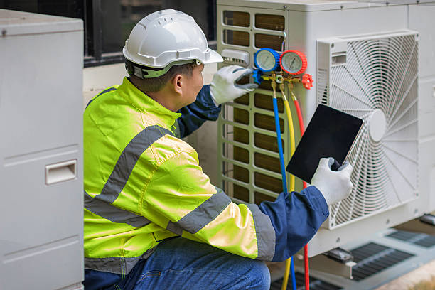 Professional Air Conditioning Repair technician working in Corona Del Mar, CA